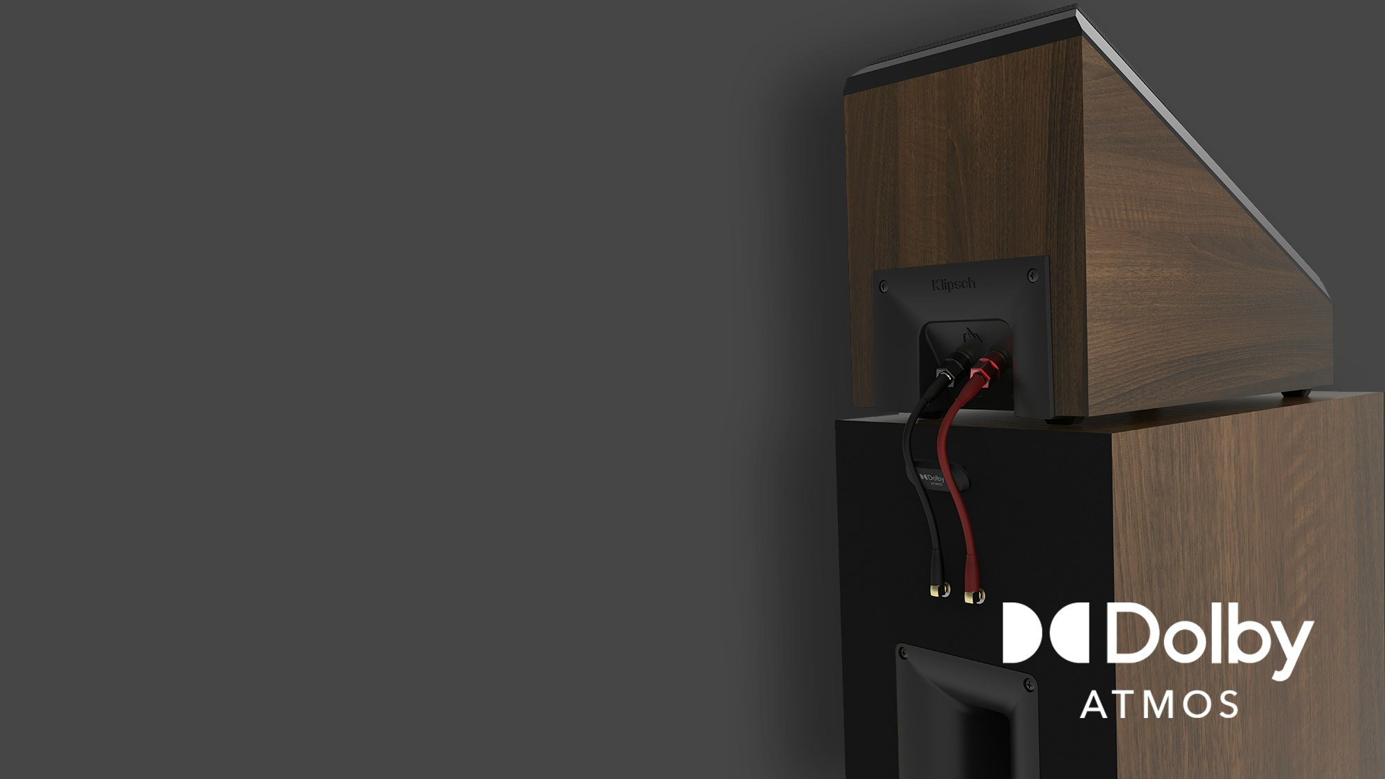 Reference Premiere II Floorstanding Speaker rear view displaying connections to an RP 500 SA Dolby Atmos elevation speaker with Dolby Atmos logo